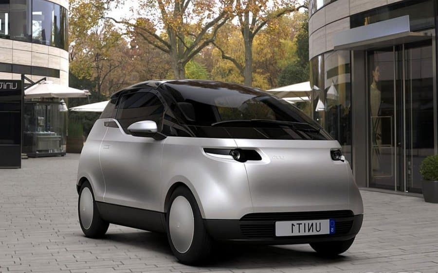 A compact electric city car in the showroom